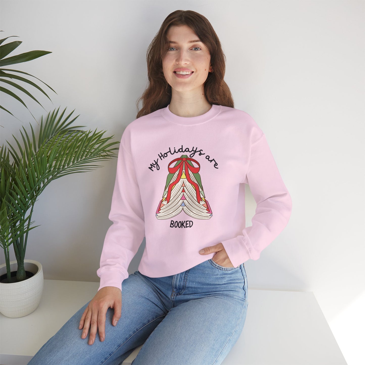 Crewneck Sweatshirt — “My Holidays Are Booked” Cozy Booklover Christmas Sweatshirt