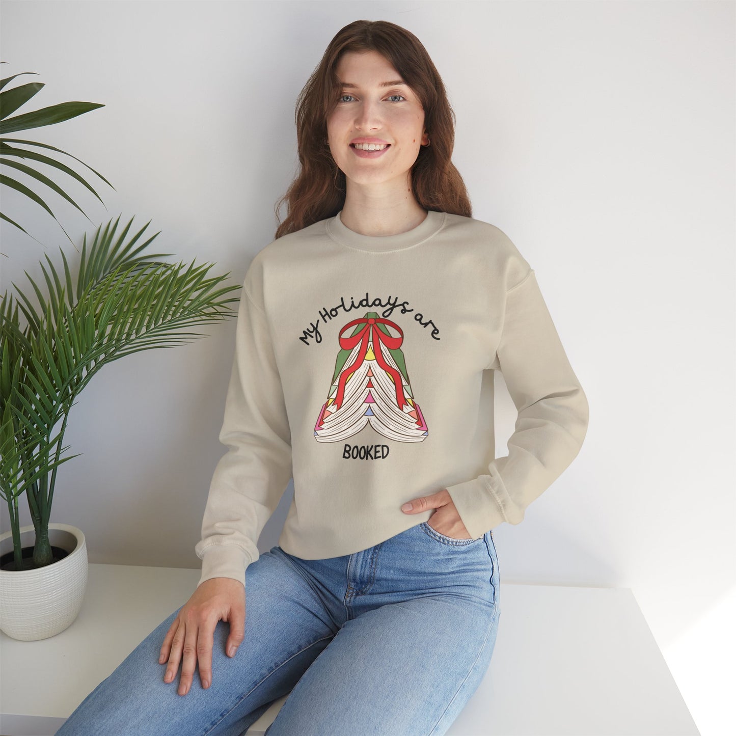 Crewneck Sweatshirt — “My Holidays Are Booked” Cozy Booklover Christmas Sweatshirt