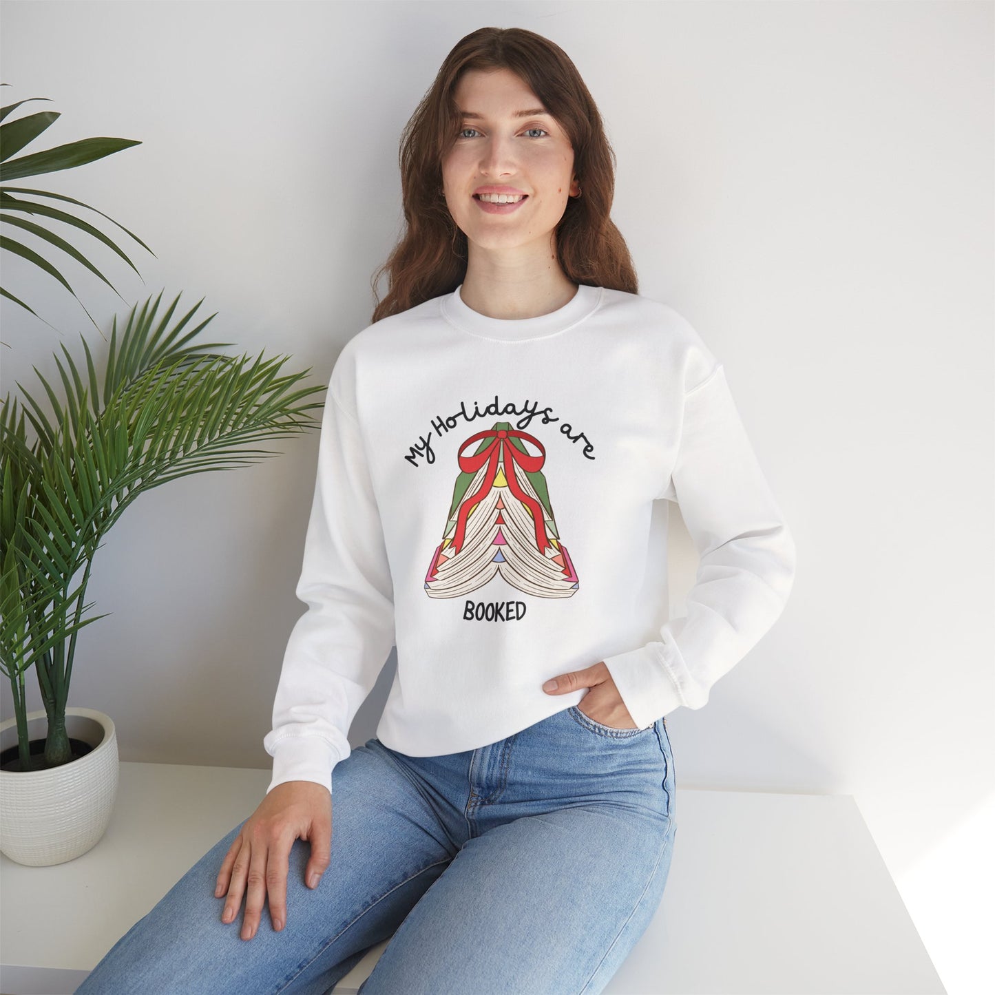 Crewneck Sweatshirt — “My Holidays Are Booked” Cozy Booklover Christmas Sweatshirt